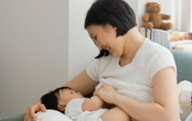 mother breast feeding her baby