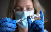 woman preparing vaccine