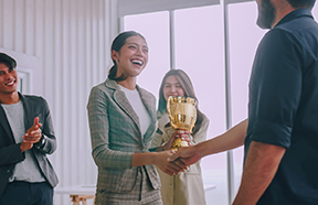 Employee with Trophy