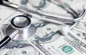 woman viewing thermometer