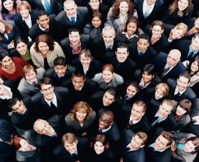 a large group of business people looking up