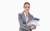 business woman holding a stack of papers
