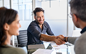 employees exchange high five